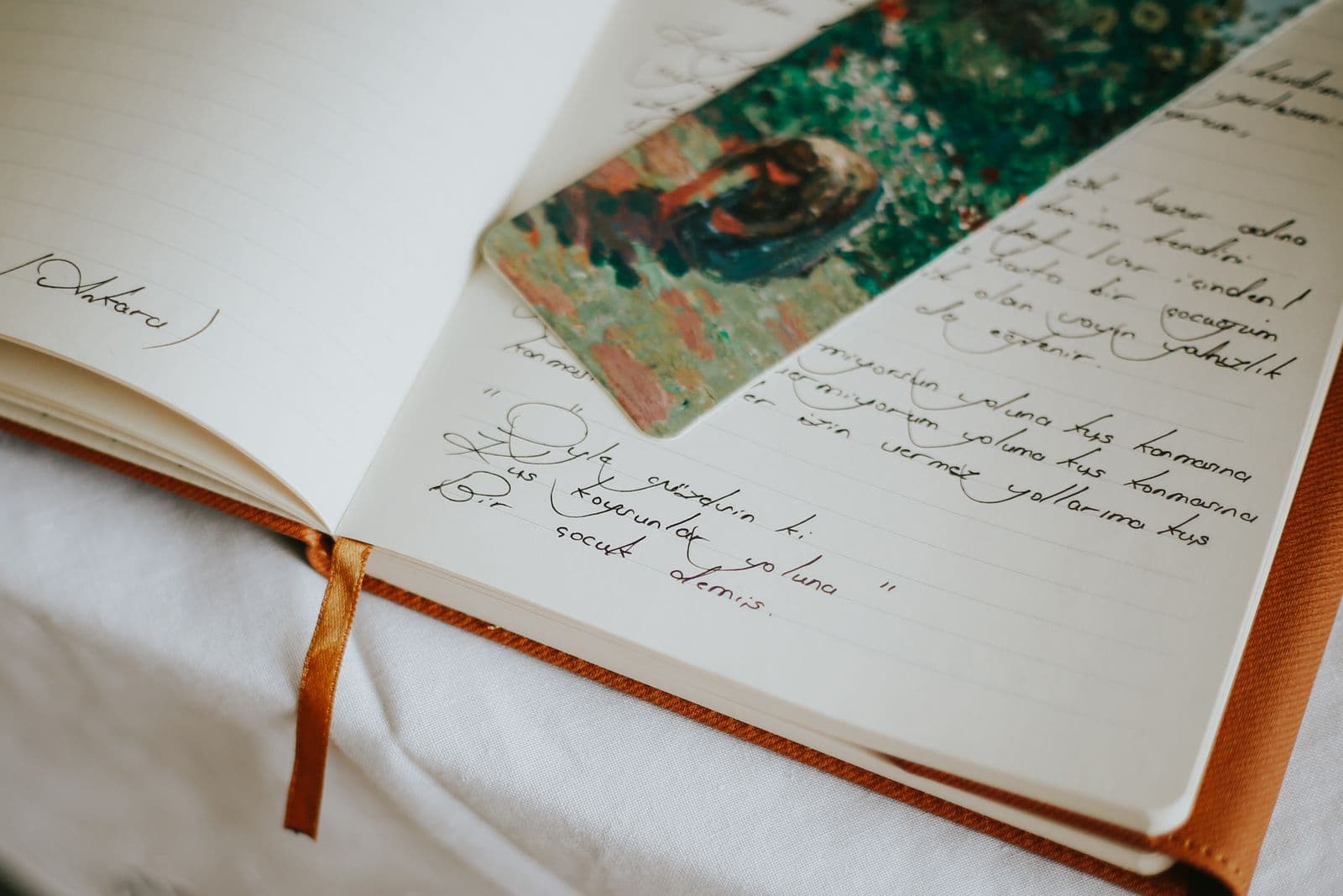 An open journal with handwritten notes